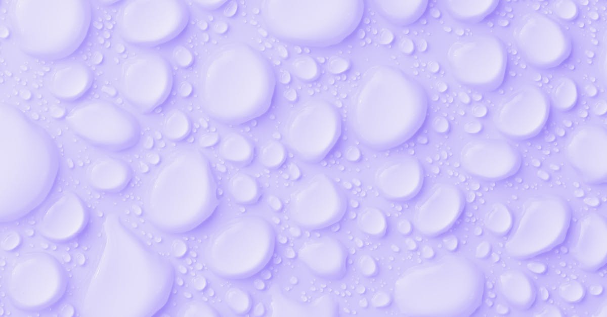 What do differently coloured slimes drop? - Waterdrops On Purple Background