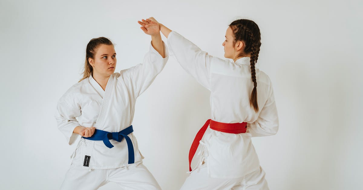 What do the red and blue buffs do? - Two Girls Showing Karate Punch and Defense