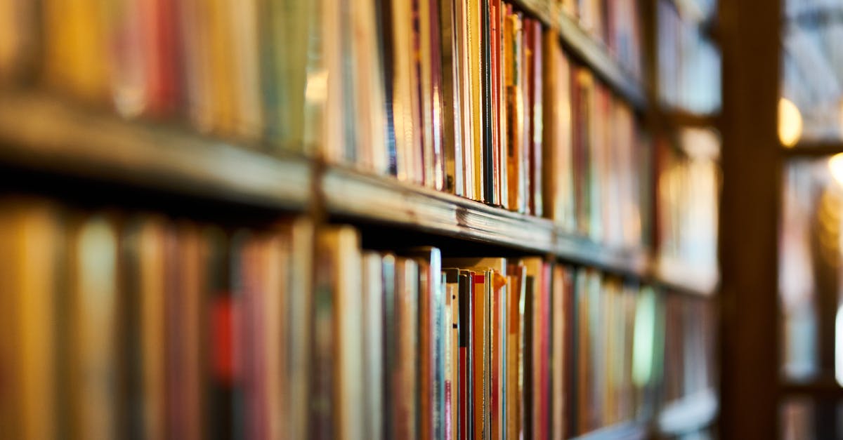 What does “the 32nd” refer to? - Selective Focus Photography of Brown Wooden Book Shelf