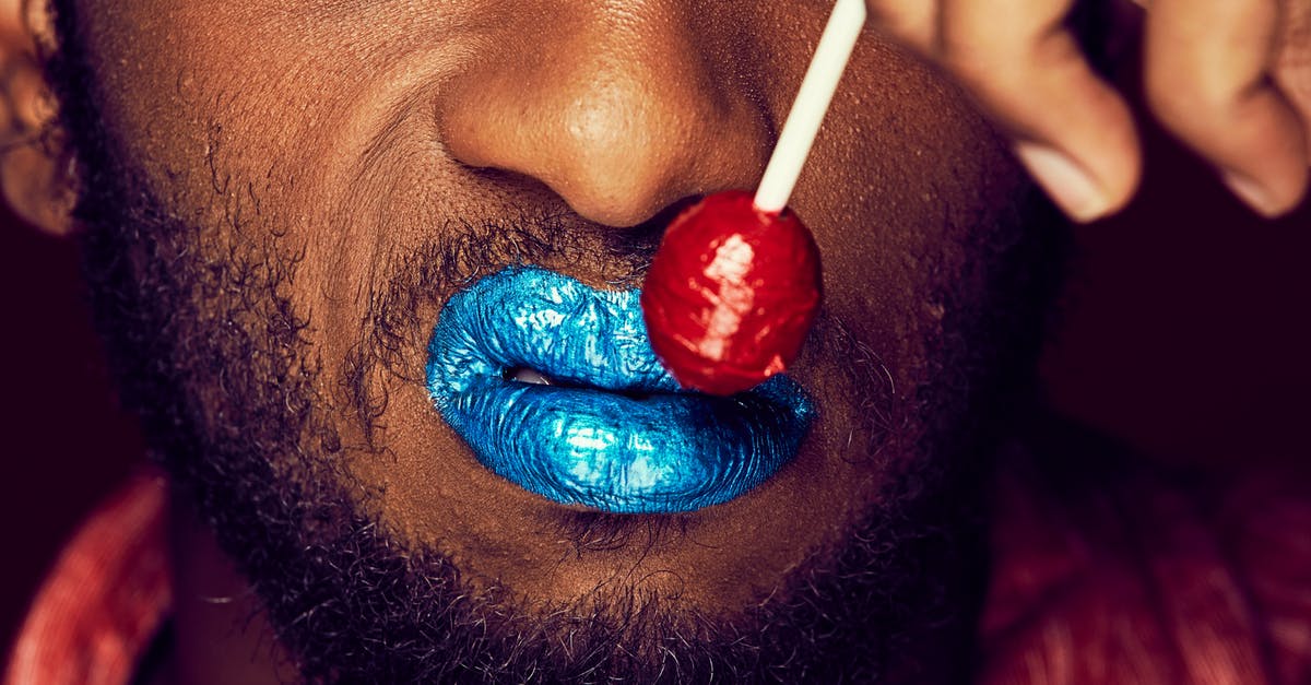 What does the candy do? - Person With Blue and Red Lip Stick