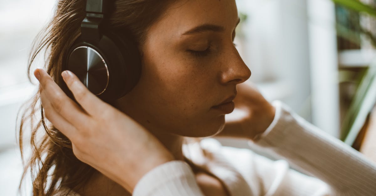 What does the chime sound while harvesting indicate? - Profile of Woman with Headphones