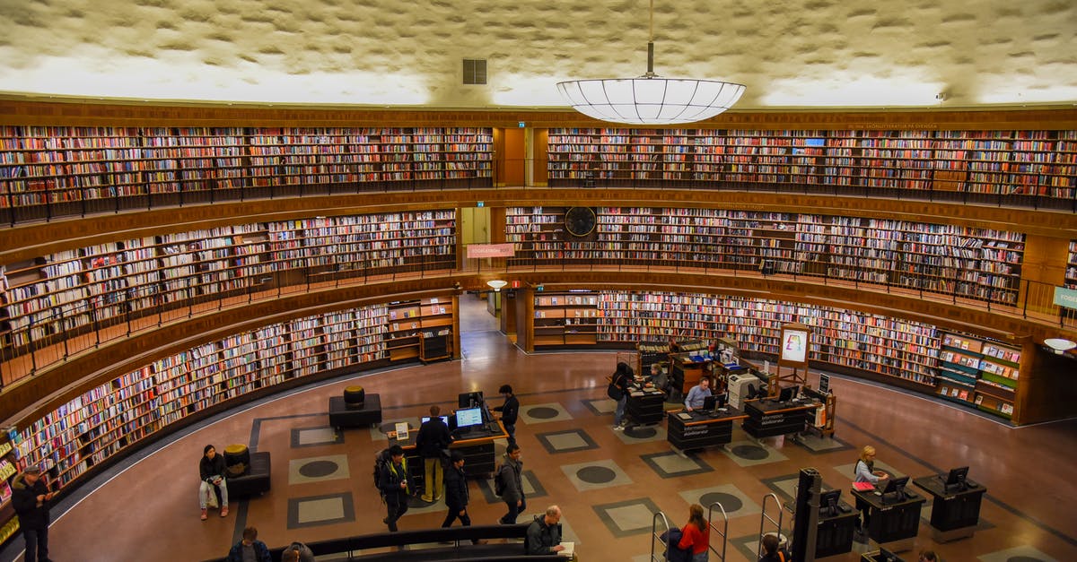 What game is this city screen from? - Modern public library with anonymous employees and visitors in hall