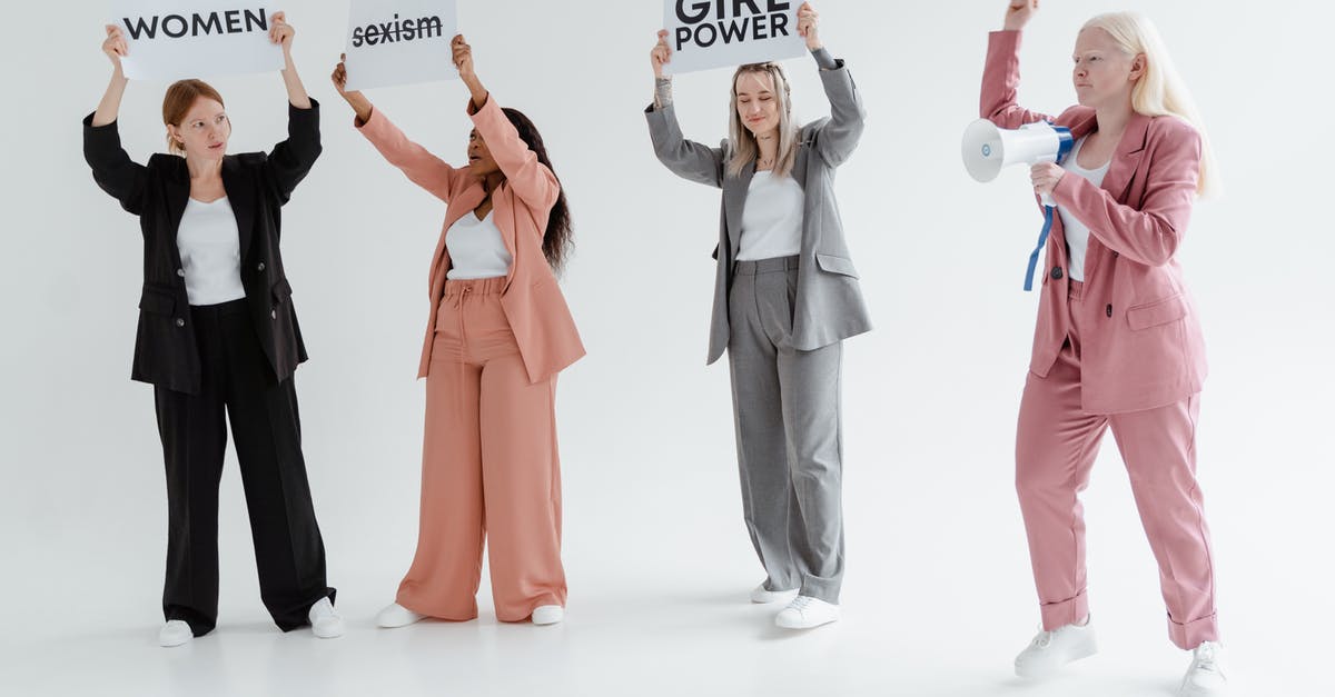 What happens if clan leaders abuse their power? - A Group of Women Standing Together while Protesting