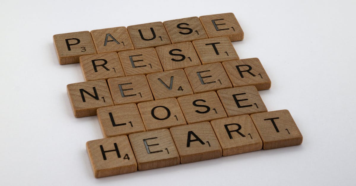 What happens if I lose all three hearts? - Close-up of Various Words Spelled out in Scrabble Tiles