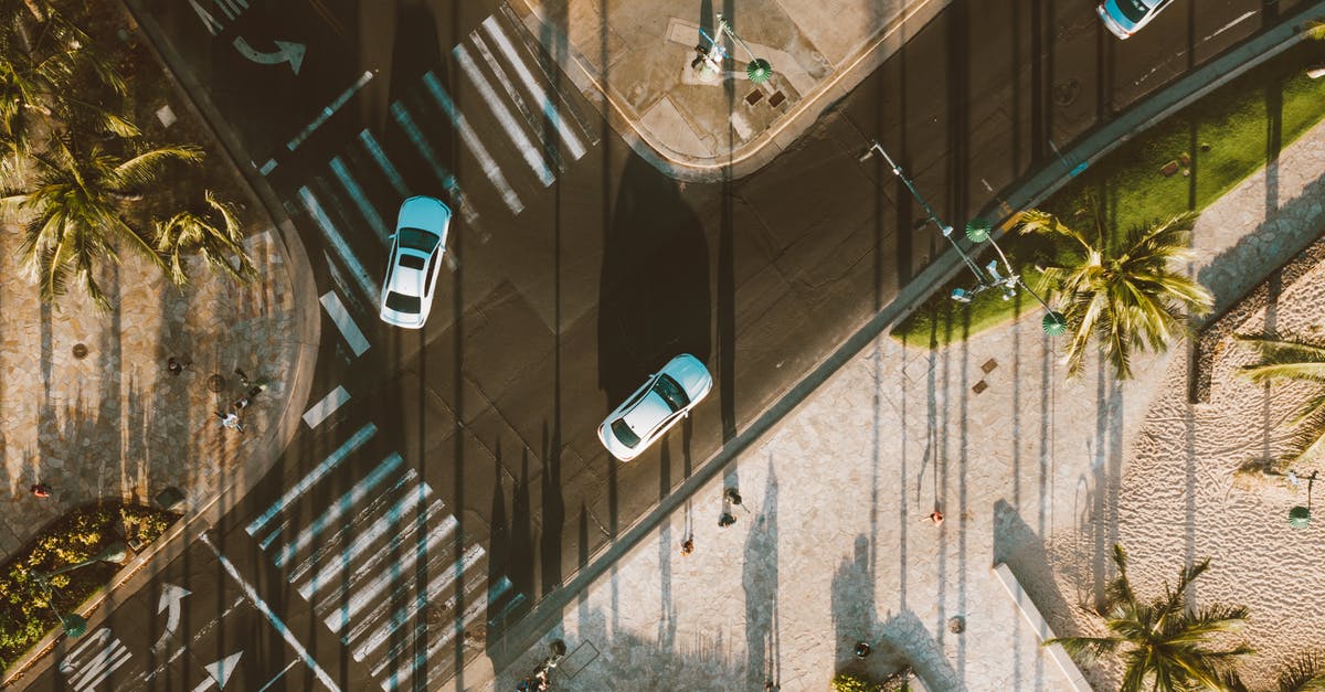 What happens to my turns when I ascend? - Aerial View of Cars on Road