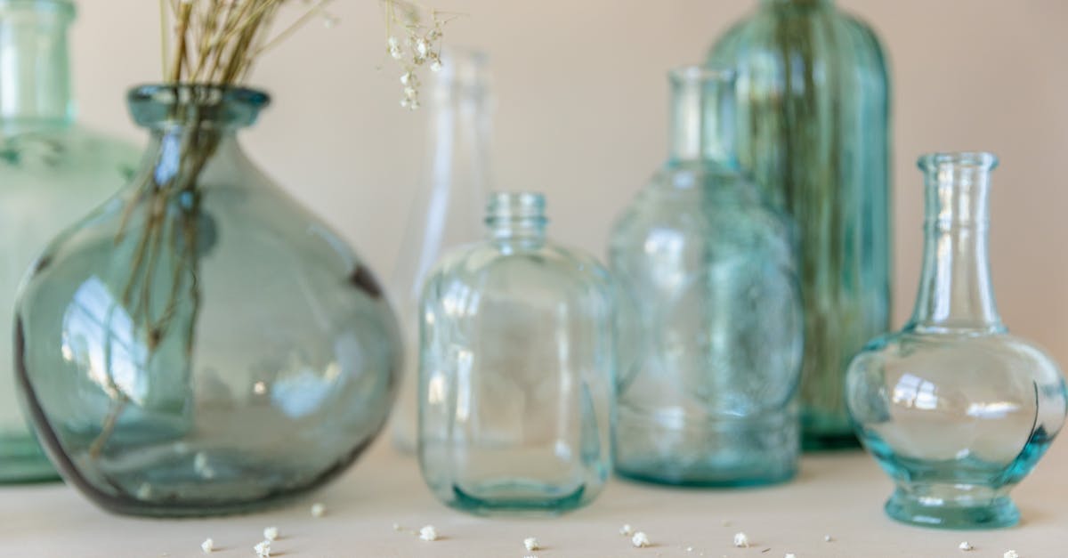 What happens to the items in your pet's inventory when your crystalline aura expires? - Three Clear Glass Bottles on White Table What happens to the items in your pet's inventory when your crystalline aura expires? - Three Clear Glass Bottles on White Table