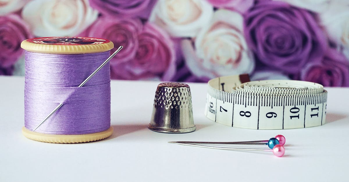 What happens to uncollected pins after battles? - Spool of Purple Thread Near Needle Thimble and Measuring Tape