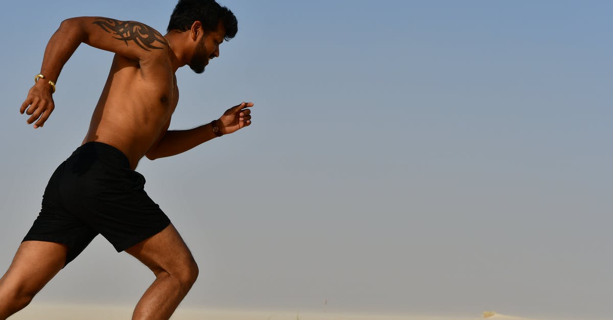 What happens when your Stamina/Psyche Meter runs out? - Strong shirtless sportsman jogging on bright day