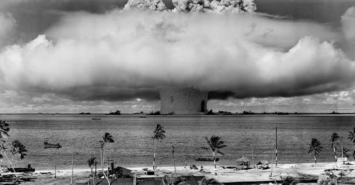 What is considered a bomb tower's "footprint"? - Grayscale Photo of Explosion on the Beach