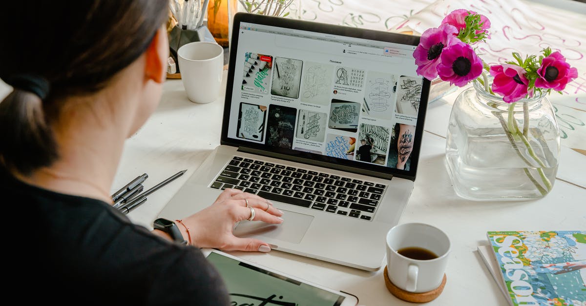 What is experience soaking? - Photo Of Person Using Laptop For Graphic Designs 