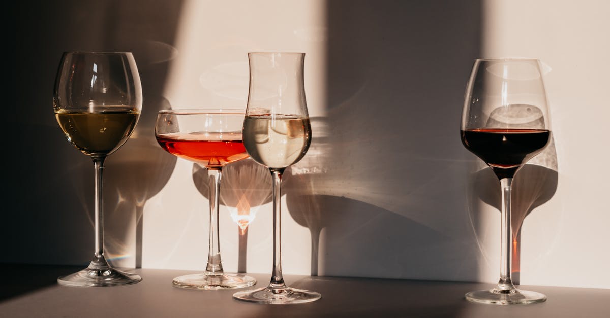 What is the difference between Crystallize and Crystallize+? - Different sorts of wine in various glasses on table in sunlight