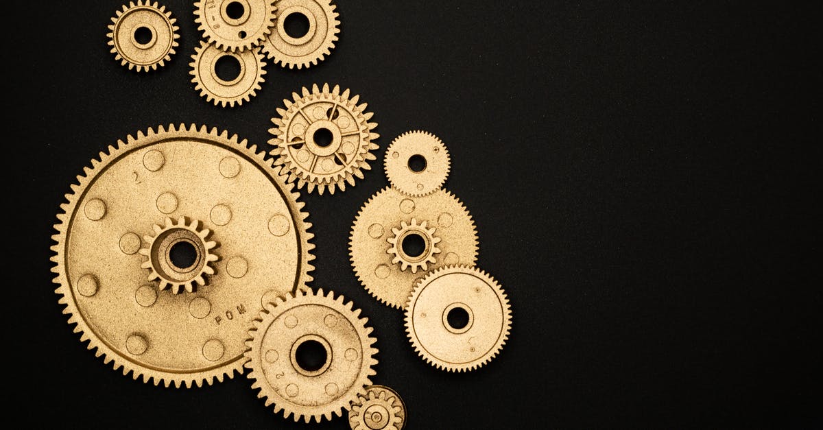 What is the difference between the Circle-K and Lawson Power Cube? - Photo of Golden Cogwheel on Black Background