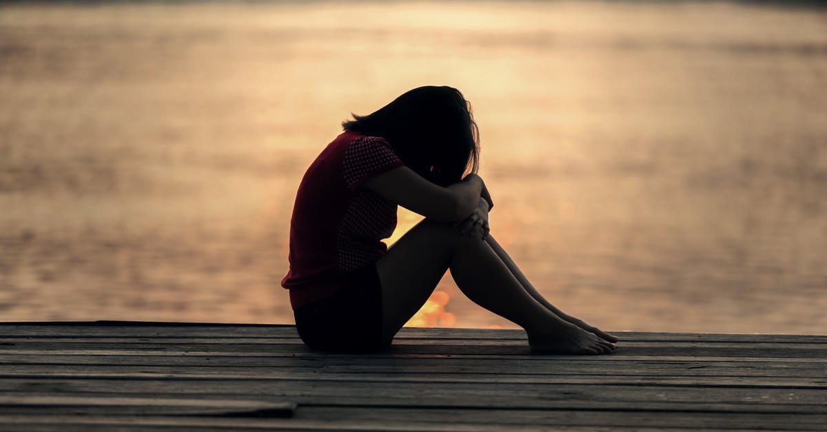 What is the FEAR strategy? - Woman Looking at Sea While Sitting on Beach