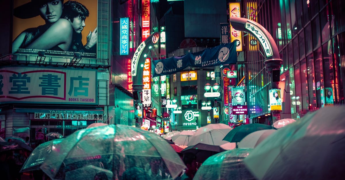 What is the Market of Time supposed to do? - People Near Buildings during Nighttime With Lights