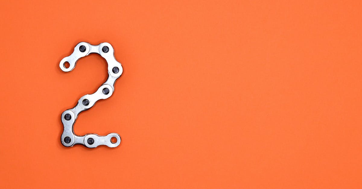 What is the number each gear has? - Gray Steel Chain on Orange Surface