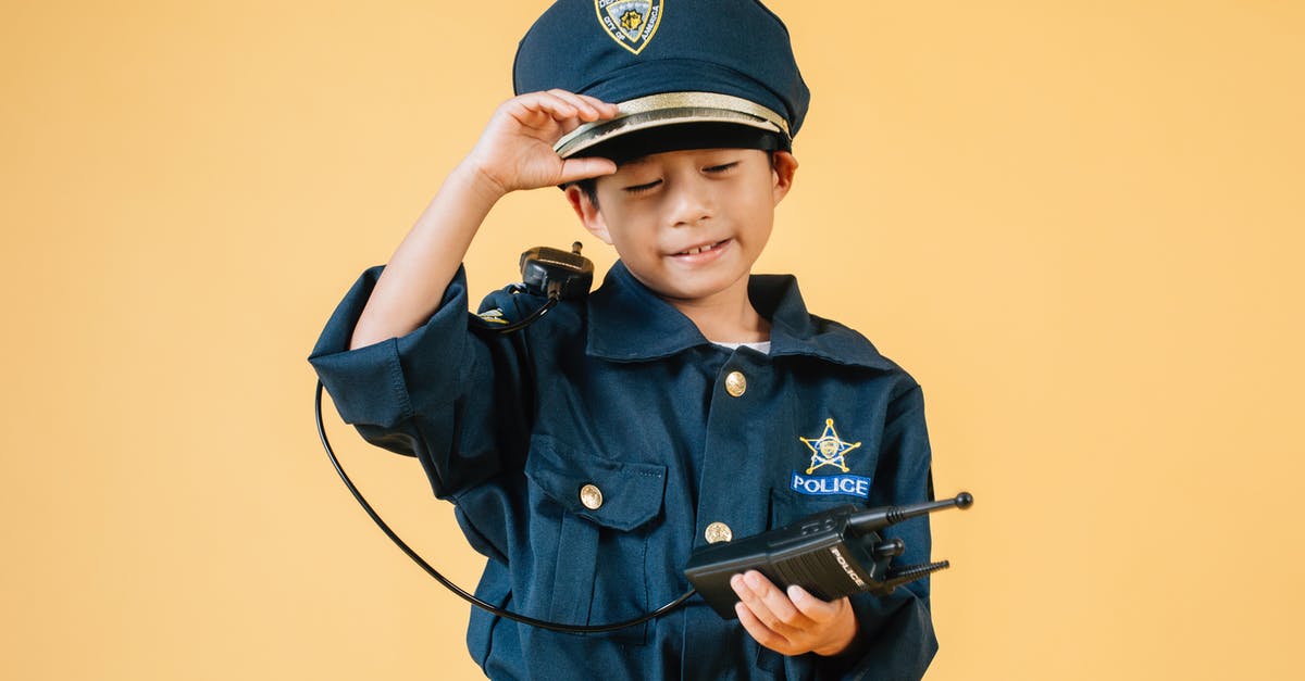 What is the purpose of the lizards in Haven? - Ethnic kid in police uniform in studio