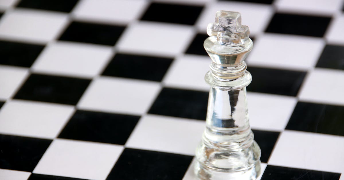 What is the strategic value of the move Memento? - Clear Glass Chess Piece on Black and White Checkered Table