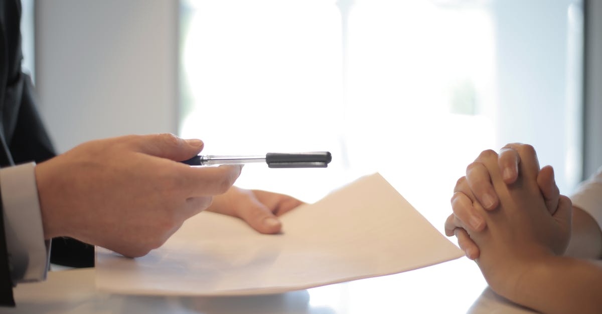 What is wrong with this custom command sign? [duplicate] - Crop businessman giving contract to woman to sign