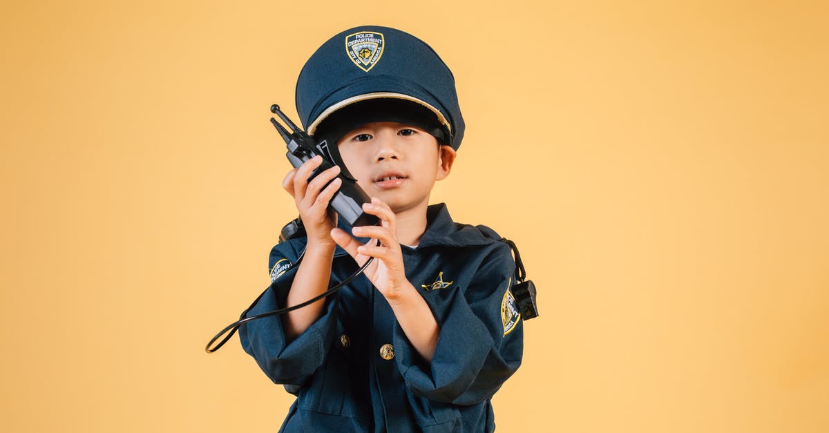 What order should I play the Half-life series in? - Serious Asian kid in police uniform with transceiver