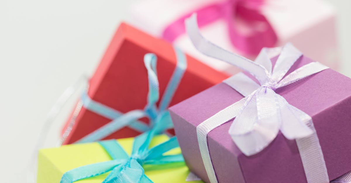 What powers do the ribbons possess? - Selective Focus Photography of Gift Boxes