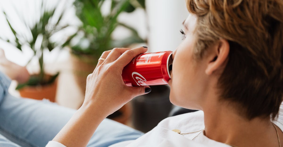 What Projectiles can Mario/Dr. Mario's Cape Reflect? - Crop unrecognizable thoughtful female enjoying coke while resting at home