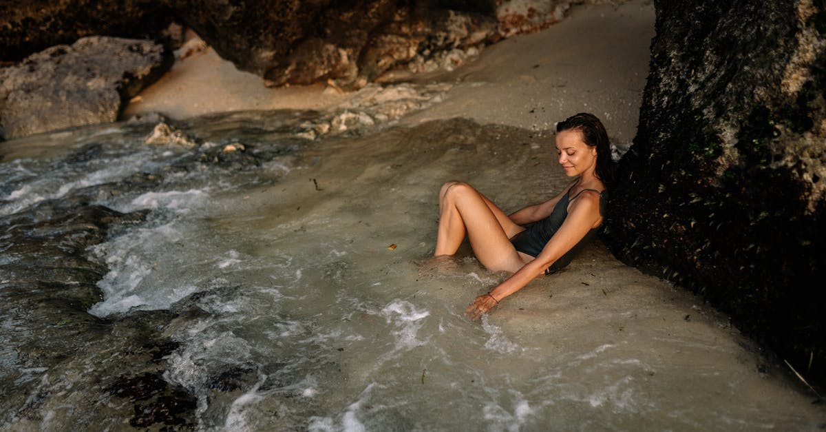 What stat should I increase to not get knocked down from body checks so easily in "Be a Pro"? - Positive woman in swimsuit leaning on mountain slope in water What stat should I increase to not get knocked down from body checks so easily in "Be a Pro"? - Positive woman in swimsuit leaning on mountain slope in water