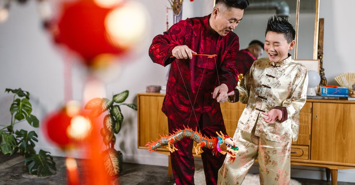 What to see before playing Dragon Age:Inquisition - 
A Father Playing with a Toy Dragon with His Son