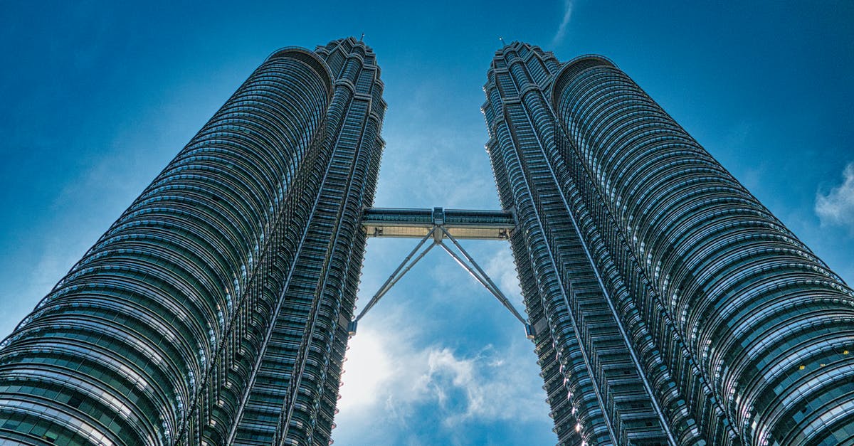 When does dashing through shots actually work? - Low Angle Photography of High Rise Building Under Blue Sky