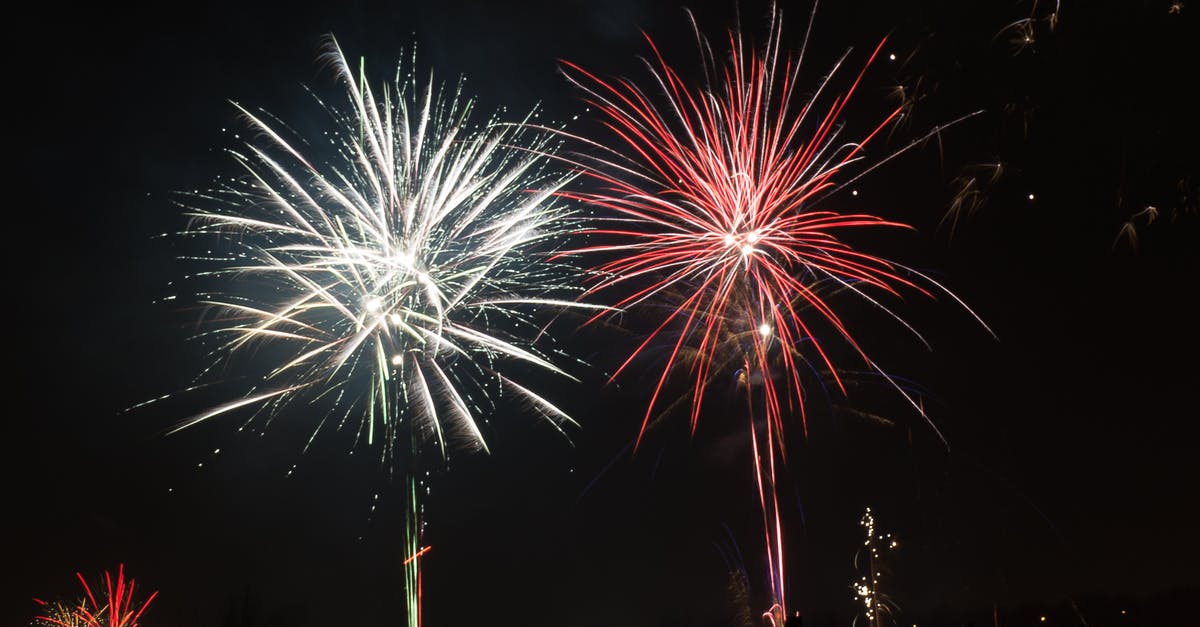 Where did this explosion occur? - Red and White Fireworks during Nighttime