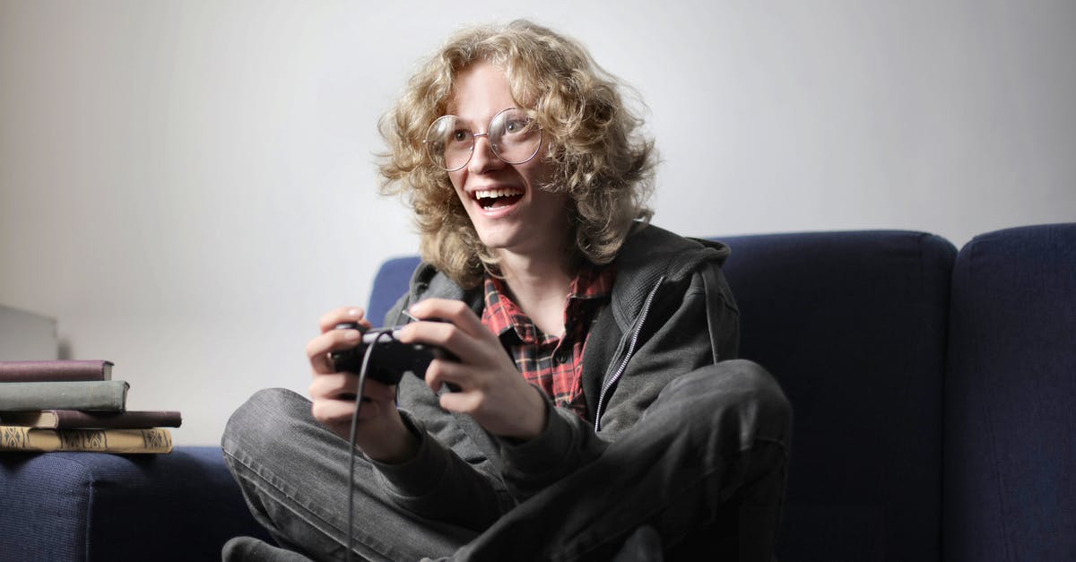 Which console versions of Diablo 3 ROS have Kanai's Cube? - Joyful teenager playing video game on TV console