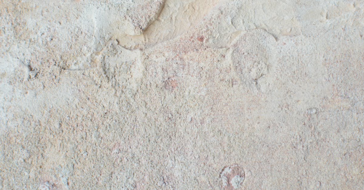 Which enemies take extra damage from sword attacks? - From above of abstract backdrop of old wall with beige stucco and uneven surface with dense texture