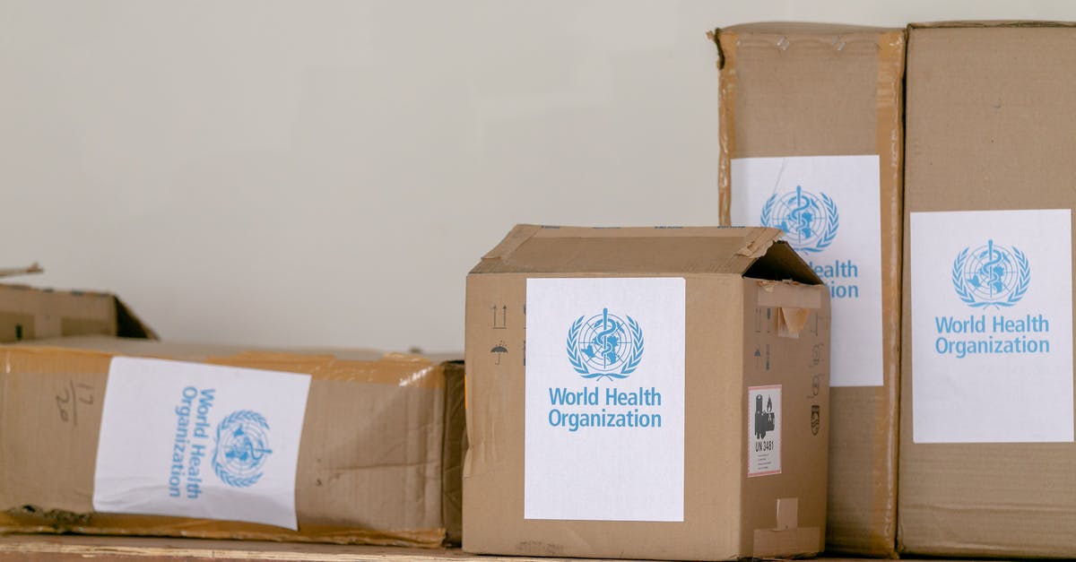 Who is “Your Opponent”? - Blue emblem sticker of World Health Organization on carton boxes heaped on table