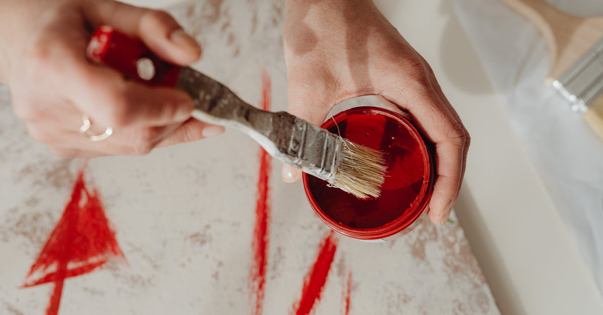 Why am I only getting 2 karma for 50 kittens? - Photo of a Person Getting Paint in a Container