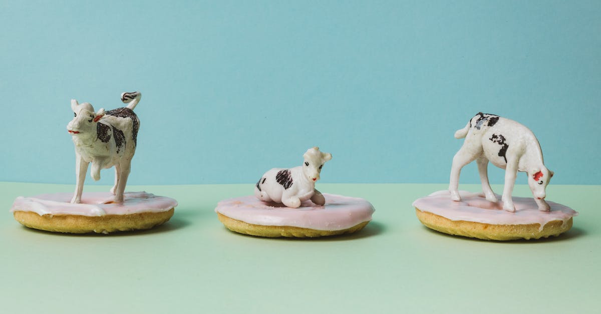 Why are there cows on my spaceship? - Cow Figurines on Top of Glazed Donuts