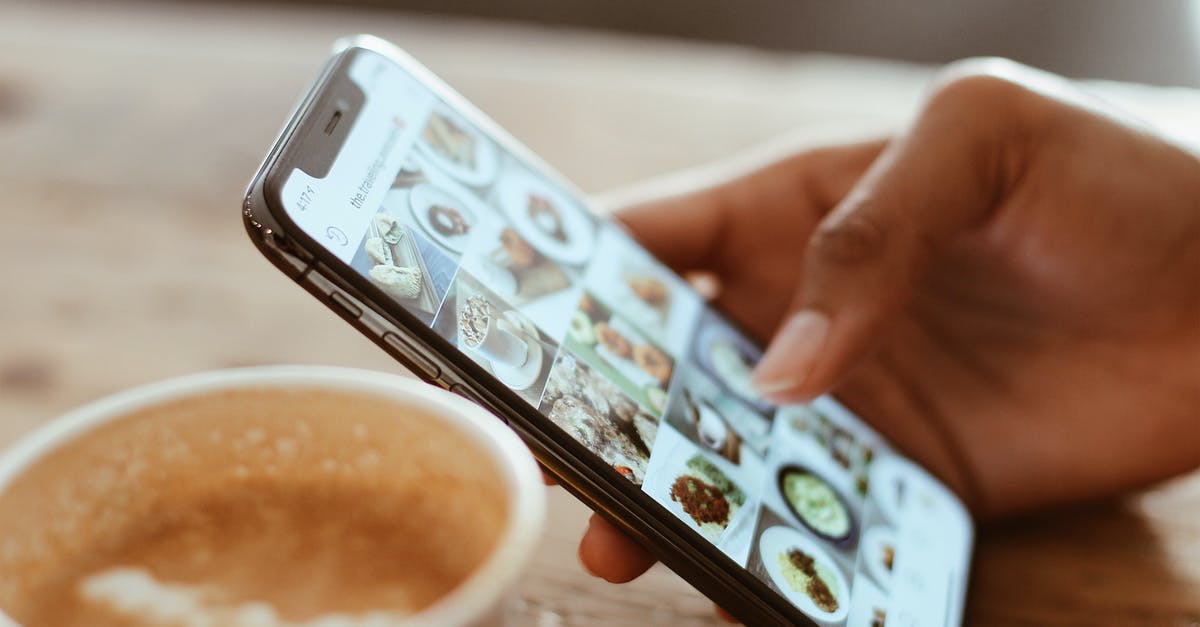 Why are there grids on every entity - Selective Focus Photography of Person Using Iphone X