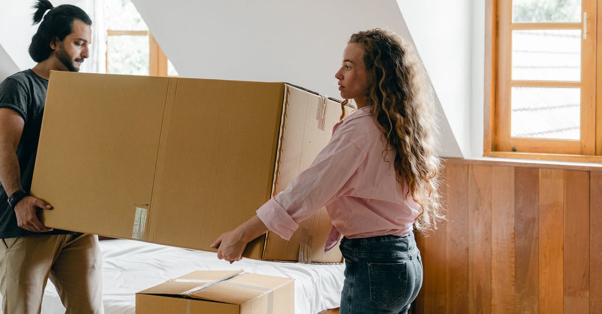 Why can't a hopper deposit into Large Chests? - Focused diverse couple relocating in new house