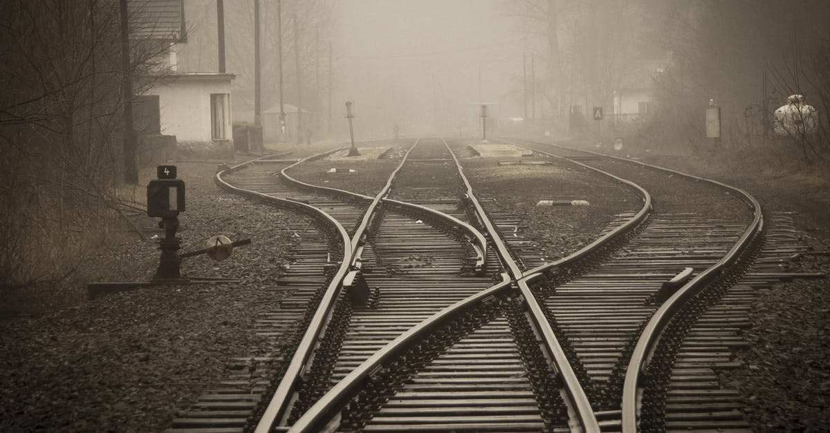 Why did my train choose the blocked path at the junction? - Railroad Tracks in City