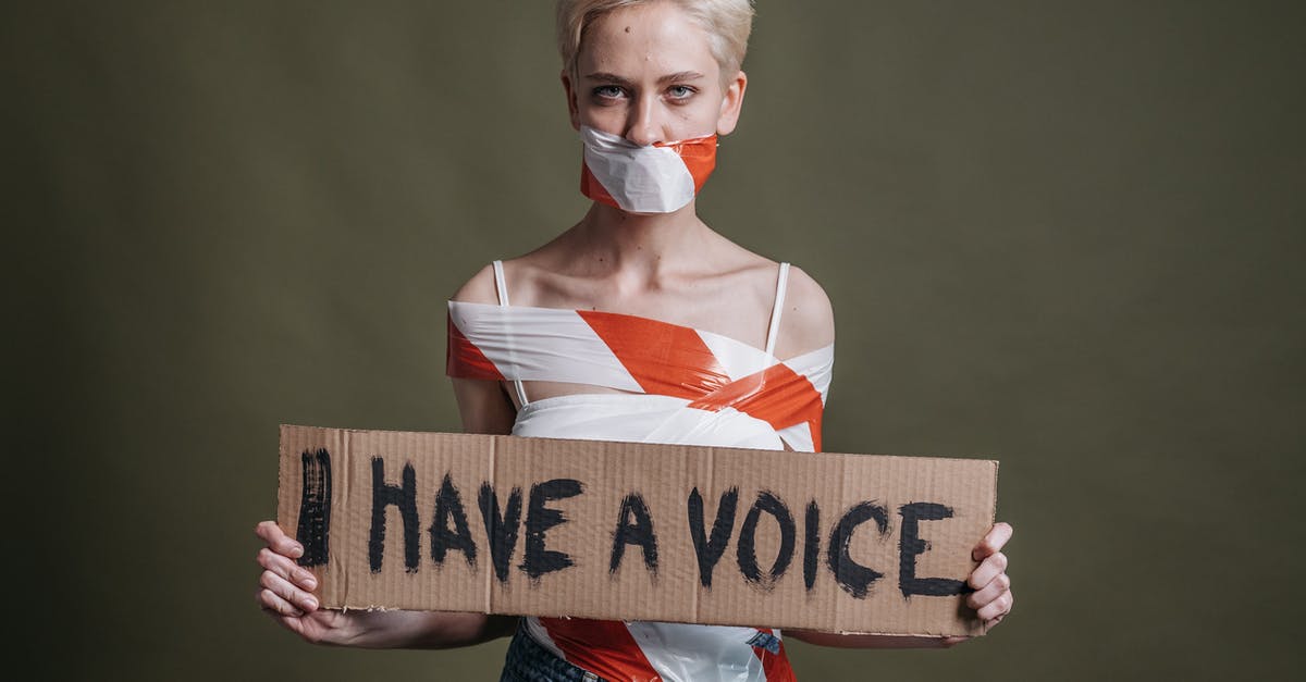 Why do I have staticy sound? - A Woman Holding a Placard