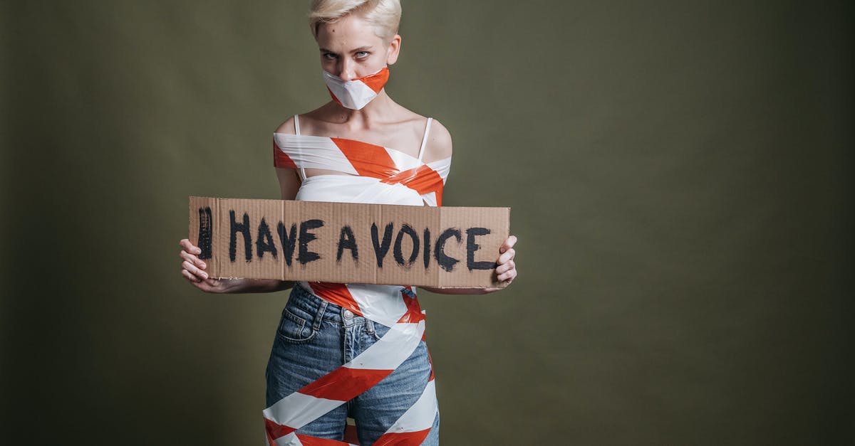 Why do I have staticy sound? - A Woman Holding a Placard