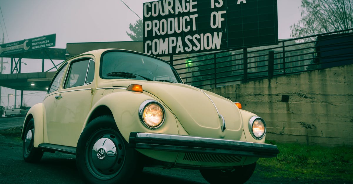 Why do the prison ages differ in Myst IV: Revelation compared to Myst and Riven? - White Volkswagen Beetle Parked Beside White and Black Building Why do the prison ages differ in Myst IV: Revelation compared to Myst and Riven? - White Volkswagen Beetle Parked Beside White and Black Building