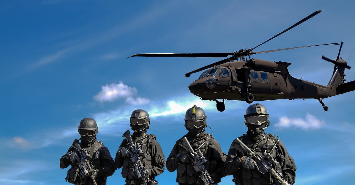 Why does a minor faction attack me once I assimilate it? - Four Soldiers Carrying Rifles Near Helicopter Under Blue Sky Why does a minor faction attack me once I assimilate it? - Four Soldiers Carrying Rifles Near Helicopter Under Blue Sky