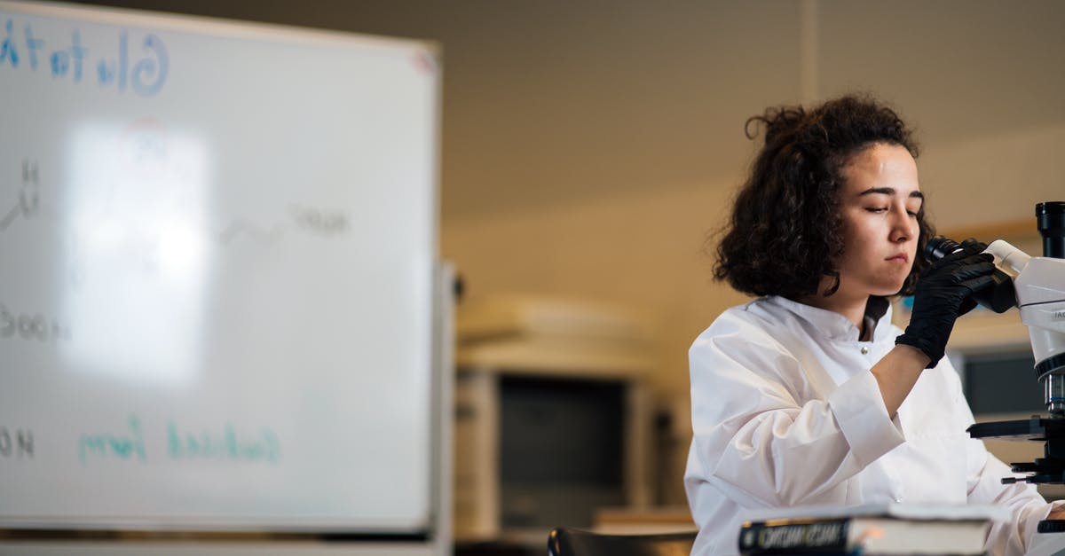 Why does my chemistry recipe not work? - Woman in White Long Sleeve Shirt Sitting by the Table