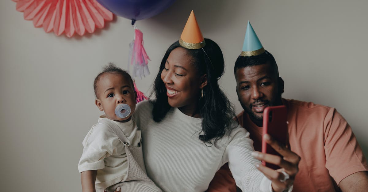 Why does the coop baby for multiplayer magnetize to the bottom right corner? - Photo of a Mother Carrying Her Child while Holding a Cell Phone Why does the coop baby for multiplayer magnetize to the bottom right corner? - Photo of a Mother Carrying Her Child while Holding a Cell Phone