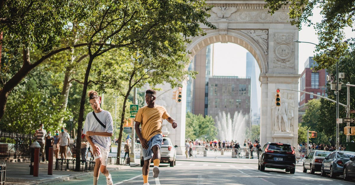 Why does this trick on the Arch-vile work? - Trendy diverse male teens skateboarding on city street in sunlight