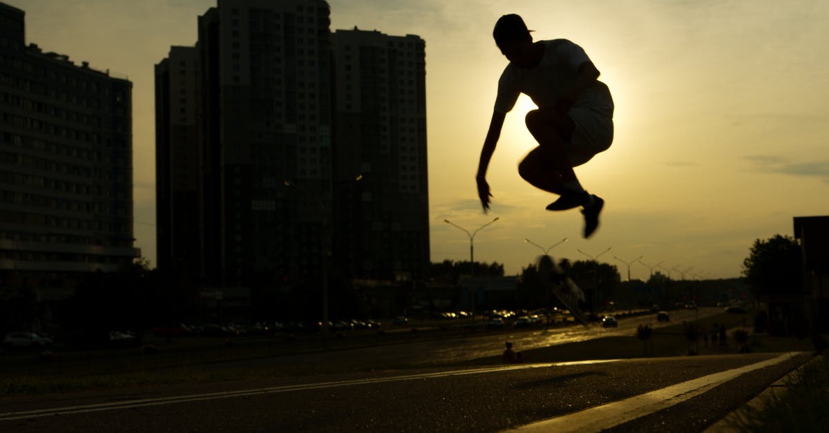 Why does this trick on the Arch-vile work? - Man in White Long Sleeve Shirt and Black Pants Jumping on Gray Asphalt Road