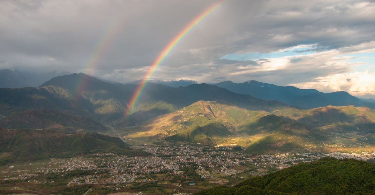 Why is Double Swing better than Frenzy? - Green Mountains Under Rainbow and White Clouds