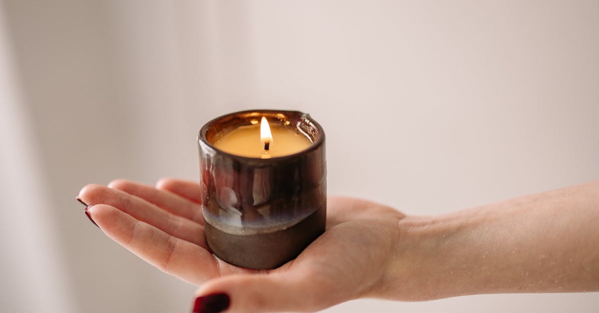 Why would someone "burn" their paragon? - Person Holding Black Candle Holder