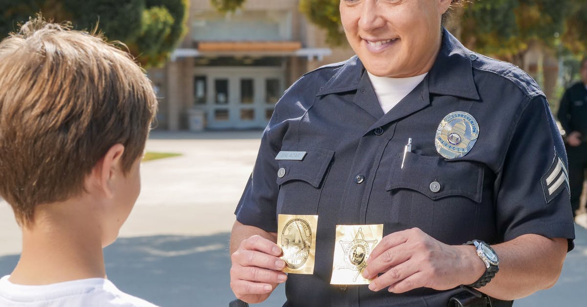 Will badges I obtain reappear in the panel? - 

A Policewoman Holding Stickers