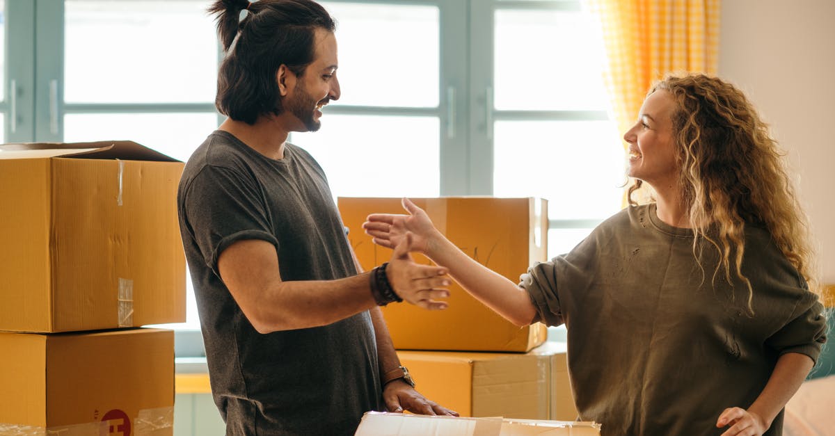 Will searching my dusty bones only give me pieces I don't have? - Happy diverse couple among carton boxes in new home Will searching my dusty bones only give me pieces I don't have? - Happy diverse couple among carton boxes in new home