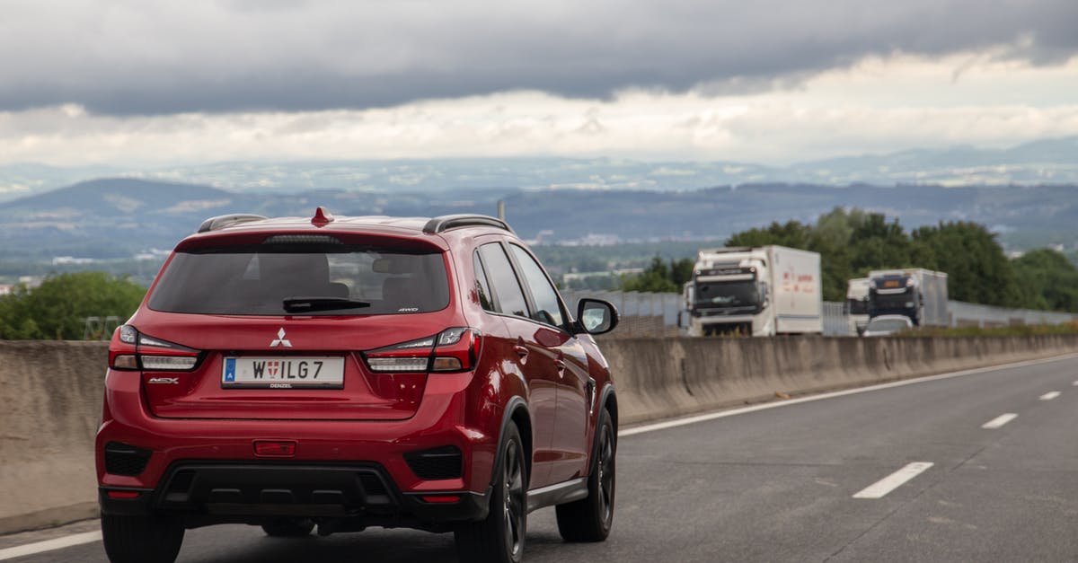 World of Trucks not synchronizing - Red Honda Car on Road